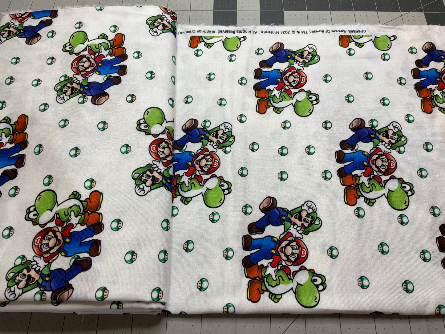 Super Mario™ Mario, Luigi & Yoshi Cotton Fabric | White | Licensed Nintendo Fabric | Sold by the Half Yard