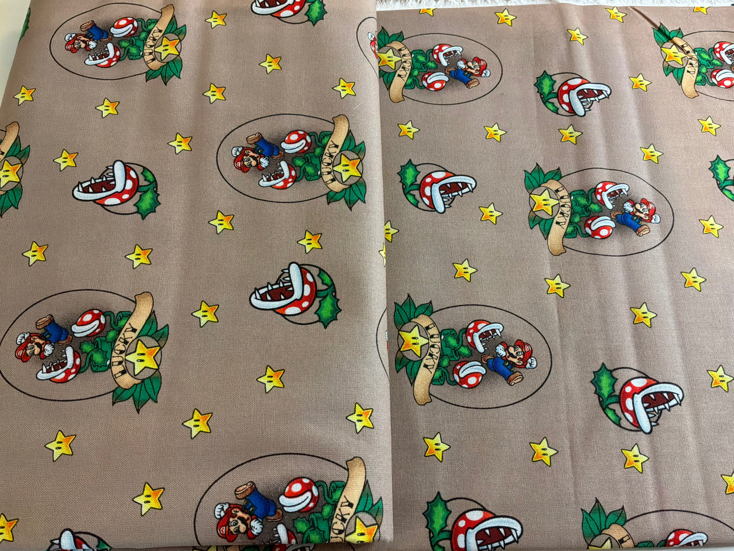 Officially Licensed Super Mario™ Piranha Plant Cotton Fabric | Taupe | Nintendo | 100% Cotton | Sold by the Half Yard