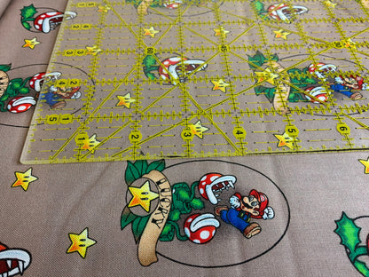 Officially Licensed Super Mario™ Piranha Plant Cotton Fabric | Taupe | Nintendo | 100% Cotton | Sold by the Half Yard